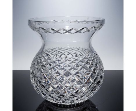This brilliant bouquet vase by Waterford Crystal showcases the brand's renowned craftsmanship, featuring an intricate crisscr