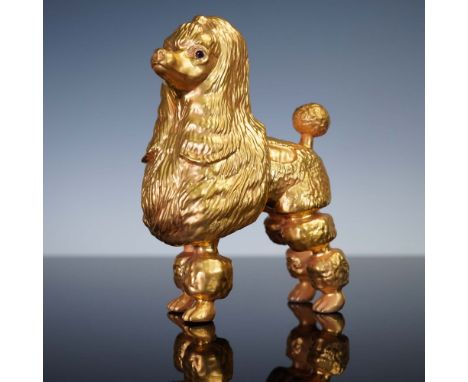 A finely crafted Boehm porcelain poodle figurine finished in radiant gold, numbered 171 from a limited U.S. edition. Features