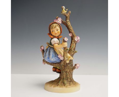 Charming Goebel Hummel figurine titled Apple Tree Girl, model 141, depicting a young girl seated in a blossoming tree with a 