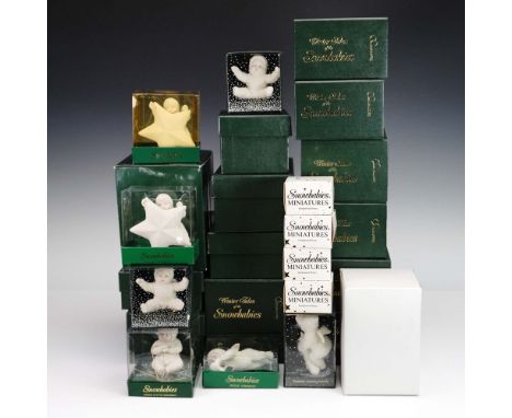 This charming 26-piece collection of Snowbabies bisque ornaments captures the whimsical spirit of winter with delightful deta