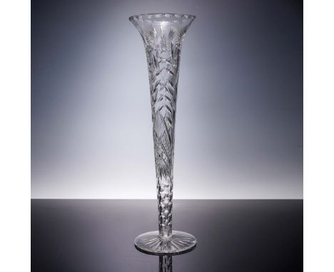 An exceptional example of American Brilliant Period (ABP) cut glass craftsmanship, this elongated fluted trumpet vase feature