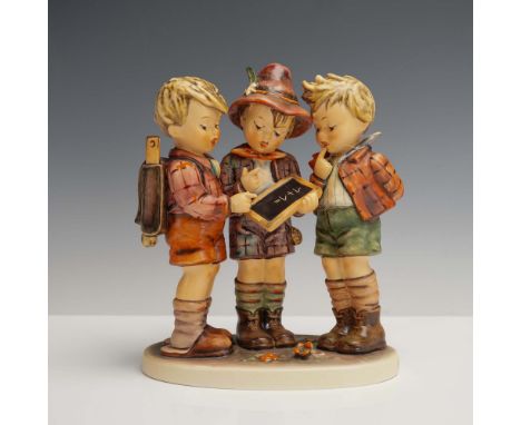 Made in West Germany by Goebel, this Hummel porcelain figurine titled School Boys captures a charming moment of three young b