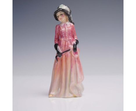 Bone china figurine, hand-painted miniature depicts a woman in period attire, dressed in a long pink and peach-toned gown wit