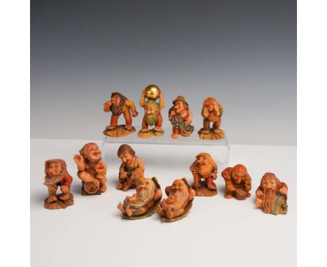 Italy: Anri, mid-to-late 20th century. A whimsical and unusual 12-piece collection of hand-carved and hand-painted wooden fig