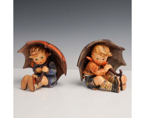 Lovely pair of figurines, each seated beneath oversized umbrellas in cozy, contemplative poses. Recognized for their expressi