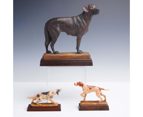 Set of three finely carved and hand-painted wooden dog sculptures by Austrian artist Helmut Diller for Anri, Italy. The group