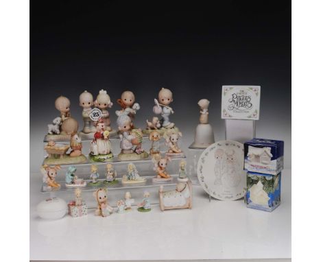 This charming 30-piece collection features a delightful assortment of Precious Moments porcelain bisque figurines, a commemor