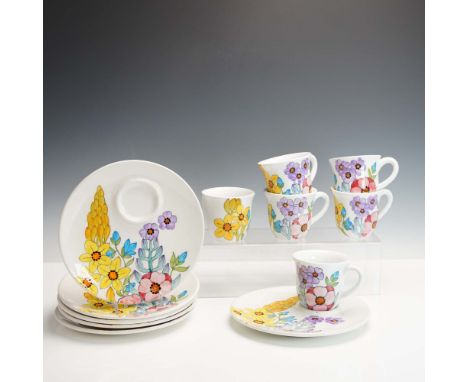 This 12-piece espresso set by Cossa Italy features six hand painted demitasse cups and matching saucers with colorful floral 