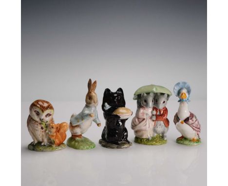 Charming collection of five hand-painted porcelain figurines from the Beswick Beatrix Potter series, featuring beloved charac