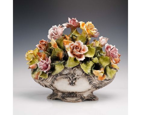 Handcrafted  ceramic floral centerpiece featuring a vibrant array of multicolored roses in blush, coral, and golden hues, nes