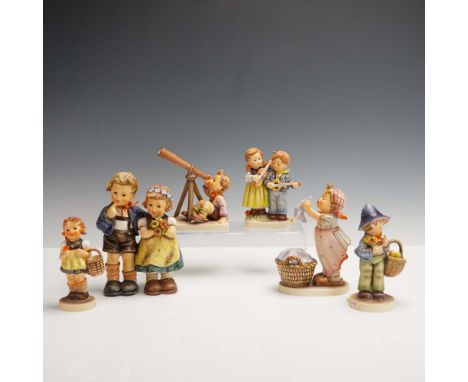 This endearing 6pc set of Hummel Goebel porcelain figurines presents a whimsical mix of childhood moments full of charm and c