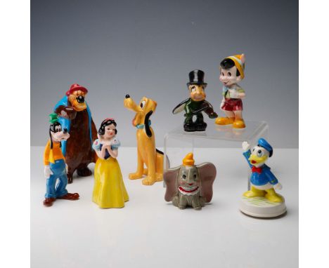 Whimsical 8-piece set of vintage hand-painted ceramic Disney character figurines, including Snow White, Goofy, Br'er Bear, Pl