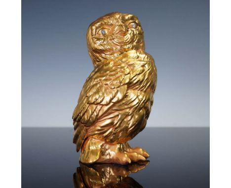 A finely crafted Boehm porcelain owl figurine finished in radiant gold, numbered 68 from a limited U.S. edition. Features det