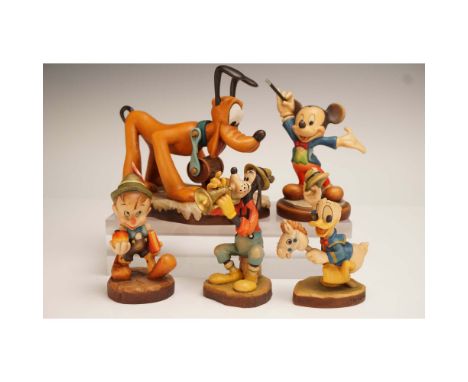Delightful set of five hand-carved and hand-painted wood figurines by Anri of Italy, created under license for Walt Disney. T