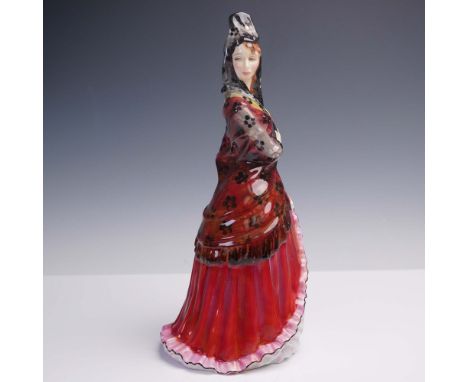 This striking Royal Doulton porcelain figurine, Mantilla HN2712, portrays a poised Spanish dancer in a ruffled crimson gown a