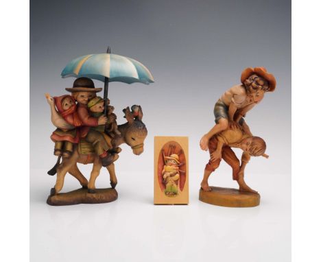 Delightful group of three carved wood pieces including two ANRI figures by Jerrandiz. The first is a highly detailed figural 