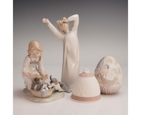 This charming four-piece collection of hand-crafted Lladro porcelain figurines includes beloved designs that celebrate whimsy