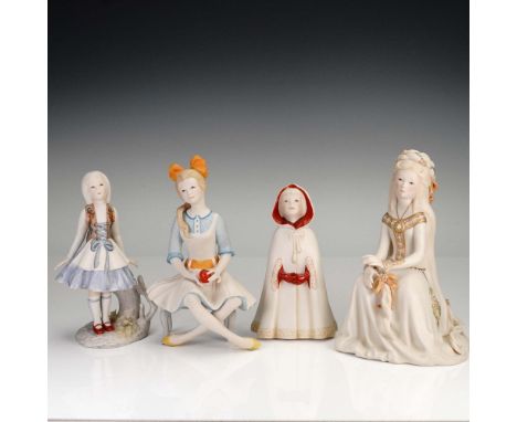 Charming collection of four Cybis bisque porcelain figurines, each representing a classic literary or fairy tale character. T