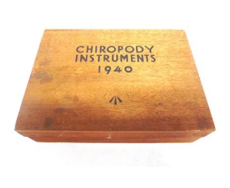 MILITARIA - A SECOND WORLD WAR SERVICE-ISSUE SET OF CHIROPODY INSTRUMENTS, 1940  by the Scholl Manufacturing Co. Ltd, in a fi