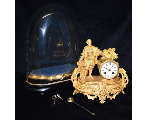 A FRENCH GILT METAL FIGURAL MANTLE CLOCK  the 8-day Japy Freres movement numbered 12339 striking on a bell, on shaped base an