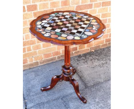 A MAHOGANY OCCASIONAL TABLE WITH SPECIMEN MARBLE CHESSBOARD TOP  64cm diameter 72cm high