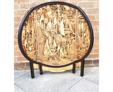 AN ORIENTAL CARVED HARDWOOD FOLDING FIRESCREEN  92cm wide