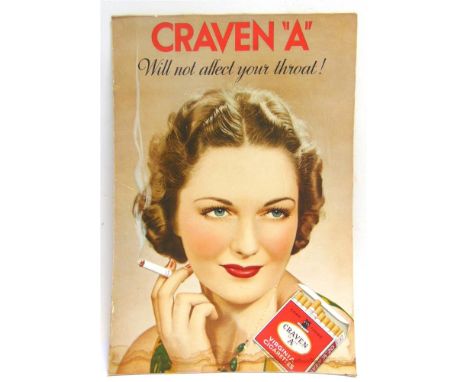 ADVERTISING - A CRAVEN 'A' CIGARETTES SHOWCARD  featuring a bust portrait of a glamorous woman holding a cigarette, 50cm x 34