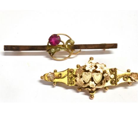 TWO EARLY 20TH CENTURY 9CT GOLD BROOCHES  a raised hearts and flowers bar brooch, fitted with a C clasp and hallmarked for Ch