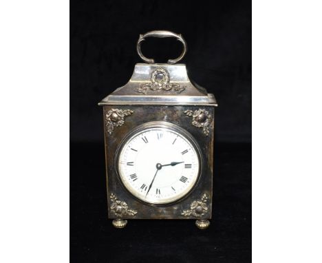 A SILVER PLATED MANTLE CLOCK  the enamel dial with Roman hour markers and Arabic quarter hour, French movement, 23cm high Con