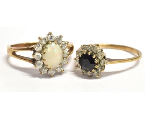 TWO 9CT GOLD RINGS  a 9ct gold white opal and crystal paste cluster ring, the oval opal measuring 0.7 x 0.5cm and surrounded 