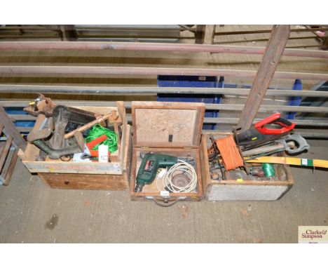 Three wooden boxes and contents of various hand tools to include saws; Bosch drill; shoe last etc