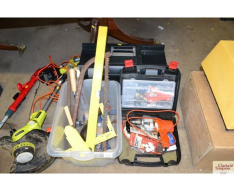 An empty plastic tool box and two boxes containing Black and Decker drill, spirit level and various other tools