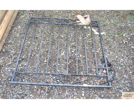 A wrought iron garden gate