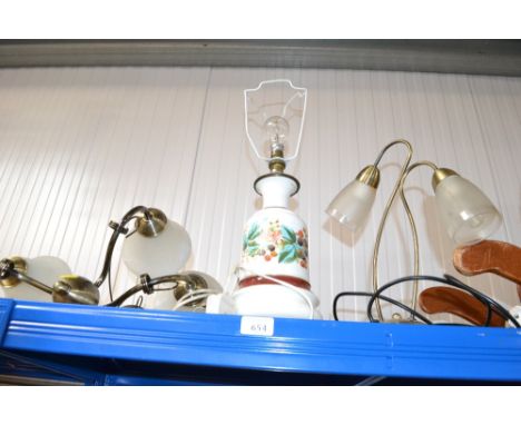 A three branch ceiling light, two branch table lamp and floral decorated table lamp