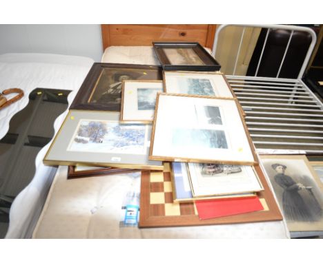 A black and white print "The Cavalier"; a coloured print "The Battle of 1st June"; a wall mirror; fashion prints; a chess boa