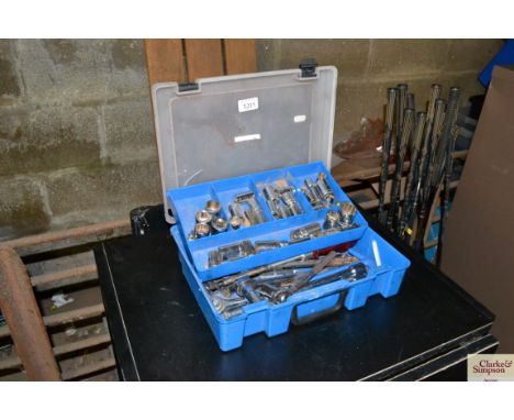 A plastic tool box and contents of tools to include sockets