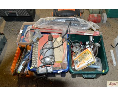 Four boxes containing various hand tools, welding rods, grease guns, two vintage drill - sold as collector's items 