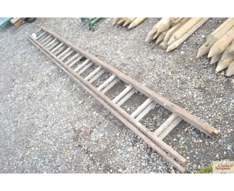 A wooden extending ladder