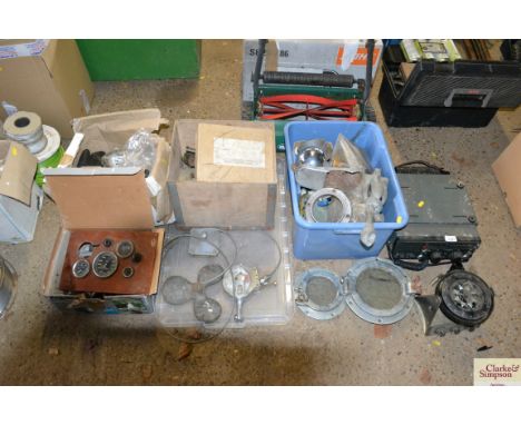 A collection of boat related items to include a gimballed compass, a Icon HF radio, an anchor, two portholes, a propeller, a 