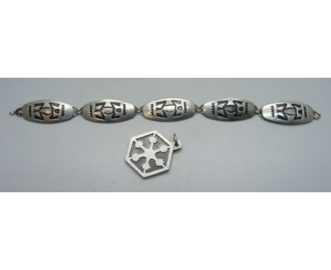 A Jorgen Jensen Danish pewter pendant, no.181 and panel bracelet, no.170A, 19cm 