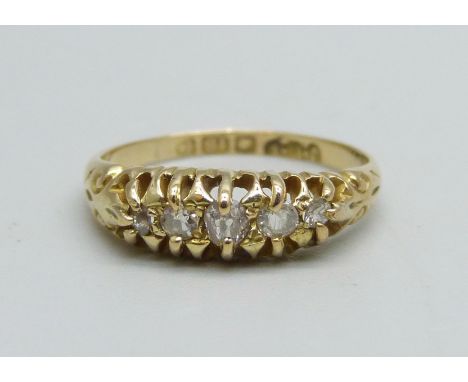 An 18ct gold, five stone diamond ring, 2.4g, K 