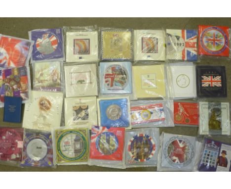 Twenty-eight coin sets, dating from 1986-2006, including a Trafalgar commemorative crown, Coronation Anniversary Crown 2003, 