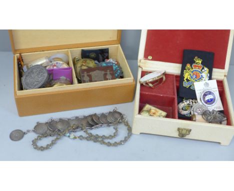 Two boxes of trinket boxes, badges, jewellery, etc. 