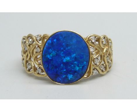 A 9ct gold ring set with a boulder opal and diamonds, 3.6g, V/W 