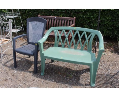 A plastic two seater bench and a plastic garden elbow chair