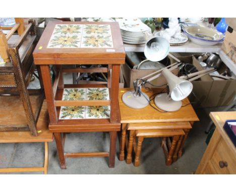 A nest of three occasional tables, a pair of teak tile top tables