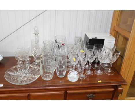 A quantity of various table glassware to include decanter and stopper; Debenhams boxed glassware; hor d'oeuves dish; tankards