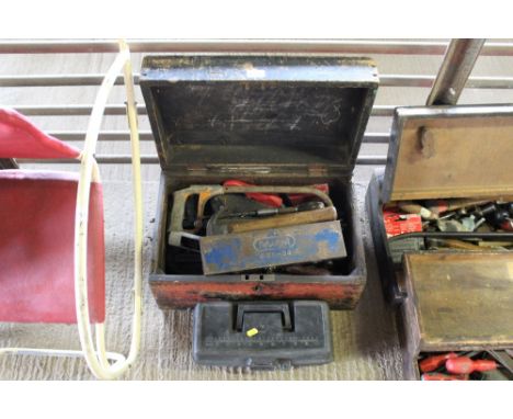 A wooden tool box containing various hand tools to include a saw, record clamps, hammers etc; a plastic tool box containing a