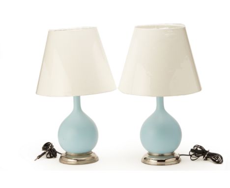 A PAIR OF BLUE GLAZED BOTTLE FORM TABLE LAMPS
Property from an Emerald Hill shophouse, the home of the interior designer behi