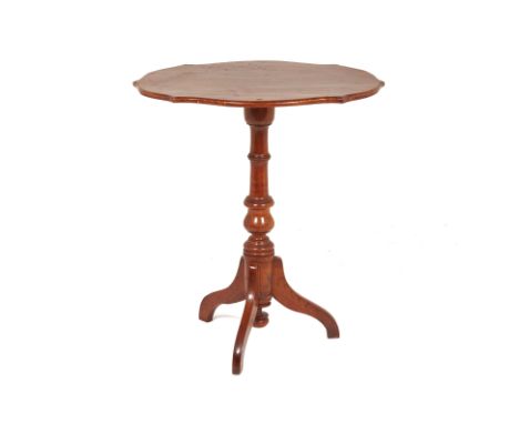 AN ANTIQUE DUTCH TRIPOD TABLE
With shaped oval top on baluster turned support and downswept supports
70cm high x 45cm wide x 